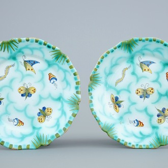 A pair of Brussels faience plates with butterflies and caterpillars, 18/19th C.