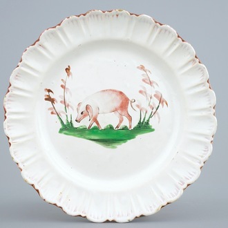 A plate with a pig in French faïence de l’Est, 18th C.