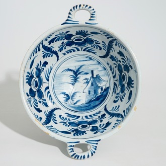 A large Dutch Delft blue and white porringer, 18th C.