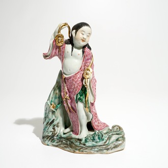 A Chinese famille rose figure of Liu Hai with the toad, 20th C.