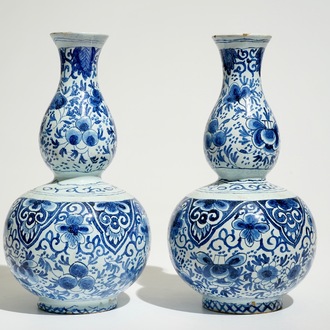 A pair of blue and white double gourd vases in Dutch Delft style, France or The Netherlands, 19th C.