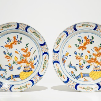 A pair of Dutch Delft polychrome dishes with hares and flowers, 18th C.