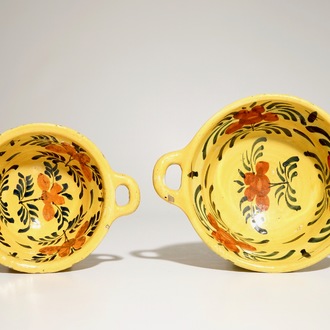 Two Dutch Delft yellow ground porringers, 18th C.