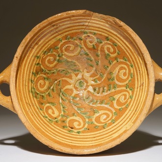 A large earthenware porringer, Northern Netherlands, early 17th C.