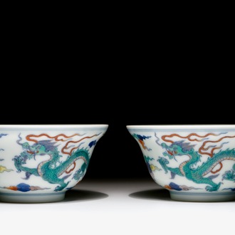 A pair of Chinese doucai "dragon" bowls, Yongzheng mark, 20th C.