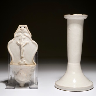 A white Dutch Delft candle stick and a holy water font, 18th C.