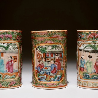 Three Chinese Canton rose medallion relief-decorated and pierced brushpots, 19th C.