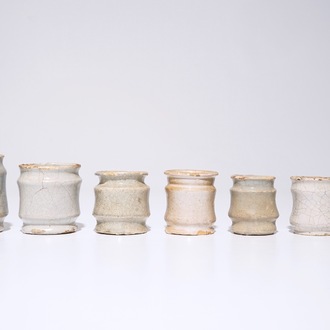 A set of seven white Dutch Delft albarello-shaped ointment jars, 17th C.