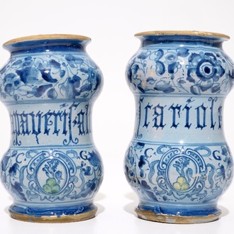 A pair of Italian maiolica alberelli, Venice, dated 1592