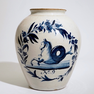 A Dutch Delft blue and white "seahorse" tobacco jar , 18th C.