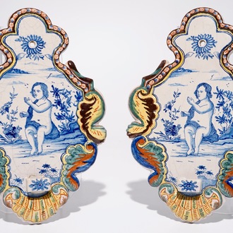 A pair of polychrome Makkum Dutch Delft wall appliques, 19/20th C.