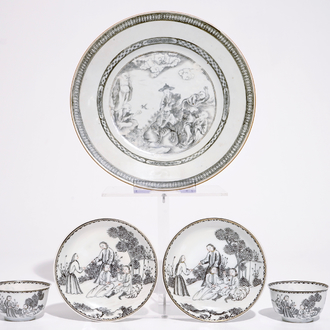 A Chinese grisaille plate with Luohan and a tiger and two cups and saucers, Qianlong