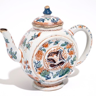 A Dutch Delft cashmire palette teapot with birds and insectes among flowers, early 18th C.