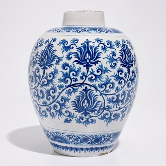 A Dutch Delft blue and white jar with peony scrolls in Ming-style, late 17th C.