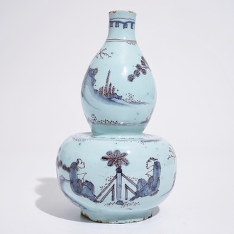 A Dutch Delft double gourd chinoiserie vase in blue and manganese, late 17th C.