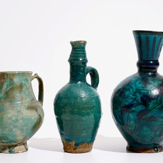 Three Islamic turquoise glazed jugs, incl. Raqqa and Iran, 14th C. and later