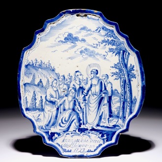 A Dutch Delft blue and white plaque with a biblical scene, 18th C.