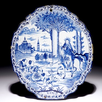 Une plaque en faïence de Delft bleu et blanc à décor religieux, 18ème