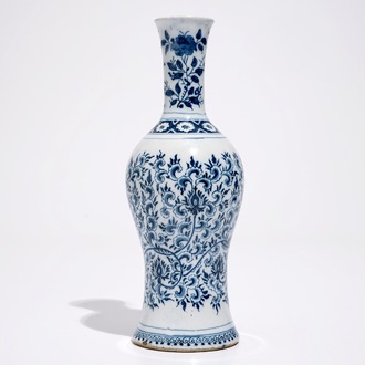 A Dutch Delft blue and white vase with peony scrolls in Ming-style, late 17th C.