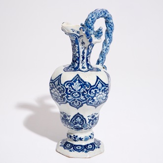 A Dutch Delft blue and white rope twist handle jug, late 17th C.