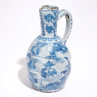 A gadrooned blue and white chinoiserie jug, Delft or Frankfurt, 17th C.