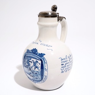 A Dutch Delft orangist text jug with the arms of King William III, 17th C.