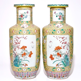 A pair of large Chinese yellow ground famille rose vases, 19/20th C.