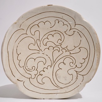 A Chinese Cizhou cream-glazed sgraffiato pillow, Song, 12th C.