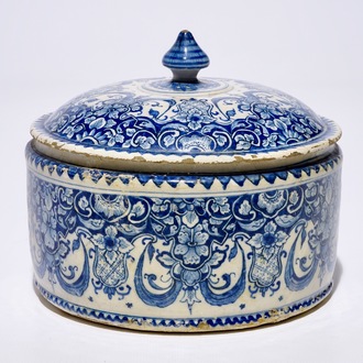 A Dutch Delft blue and white tobacco box and cover, 18th C.