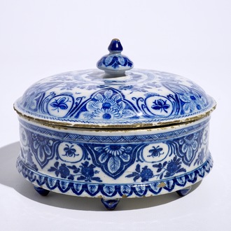 A round Dutch Delft blue and white spice box and cover, 18th C.