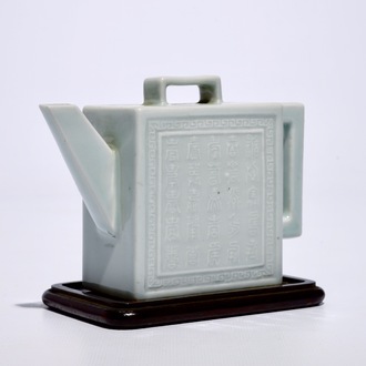 A square Chinese celadon glazed teapot with relief design, Qianlong mark, 19/20th C.