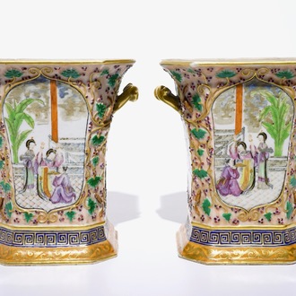A pair of Chinese famille rose export bough pots with twisted handles and relief-decorated squirrels, Qianlong