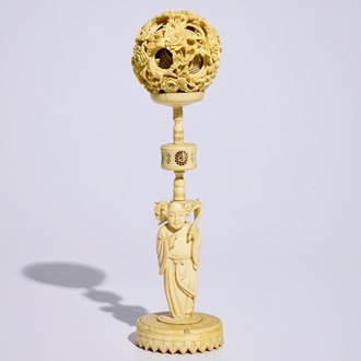 A Chinese carved ivory puzzle ball on stand, Canton, 19th C.