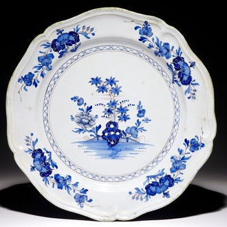 A large French faience Delft style dish, Saint Amand, 18th C.