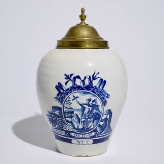 An unusual Dutch Delft blue and white tobacco jar inscribed "De Hoop", with brass cover, 18th C.