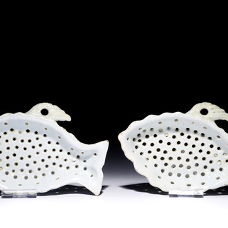 A pair of white Dutch Delft fish-shaped strainers, 18th C.