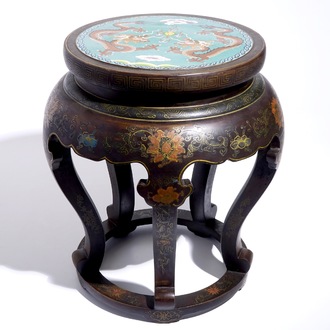 A Chinese lacquered wood and cloisonné stand, 20th C.