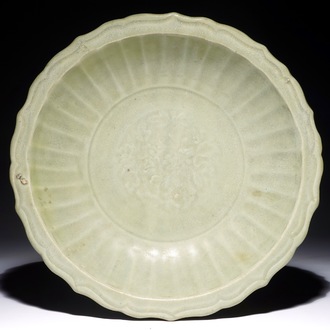 A Chinese Longquan celadon shipwreck dish with underglaze design, Ming