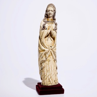 A tall Indo-Portuguese polychrome ivory model of a Madonna, Goa, 17h C.