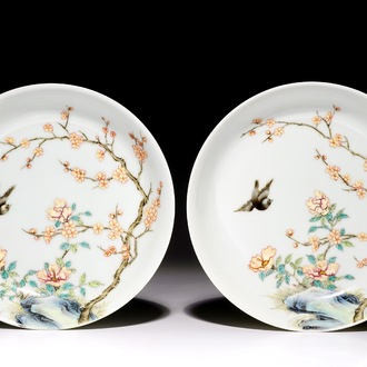 A pair of Chinese famille rose plates with a bird approaching a blossoming branch, Yongzheng mark, 20th C.