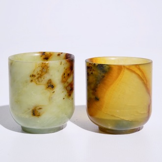 Two Chinese mottled jade wine cups, 20th C.