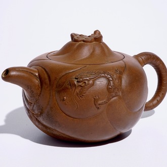 A Chinese Yixing stoneware teapot and cover with dragons, 19/20th C.