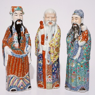A set of three Chinese famille rose figures of immortals, 19/20th C.