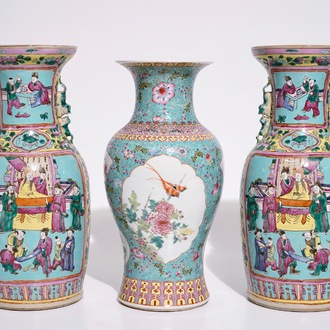 A pair of Chinese famille rose on turquoise ground vases, 19th C., and a vase with Qianlong mark, 20th C.