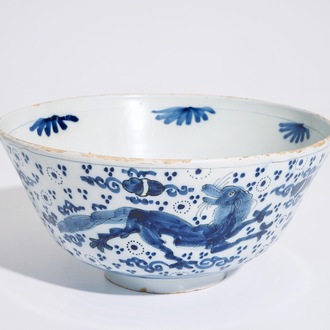 A Dutch Delft blue and white chinoiserie bowl with dragons, late 17th C.