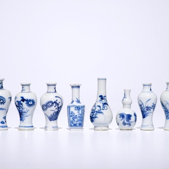Ten Chinese blue and white miniature dolls house vases, mostly Kangxi