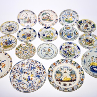 Four polychrome Dutch Delft chargers and thirteen plates, mostly 18th C.