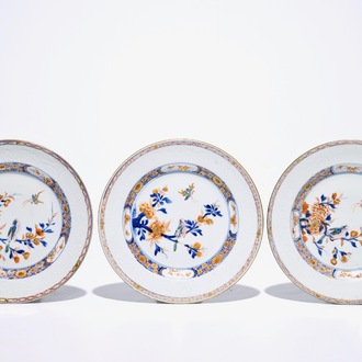 Three Chinese underglaze-decorated rose-imari plates with birds among blossoms, Yongzheng/Qianlong