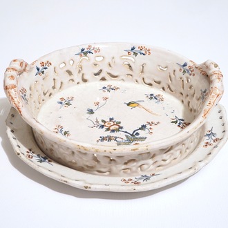A reticulated polychrome Brussels faience “La Haie Fleurie” basket on stand, 18th C.