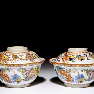 A pair of rare polychrome Dutch Delft bowls and covers, early 18th C.